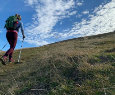 Woman hiking showing why fit matters in women's hiking trousers