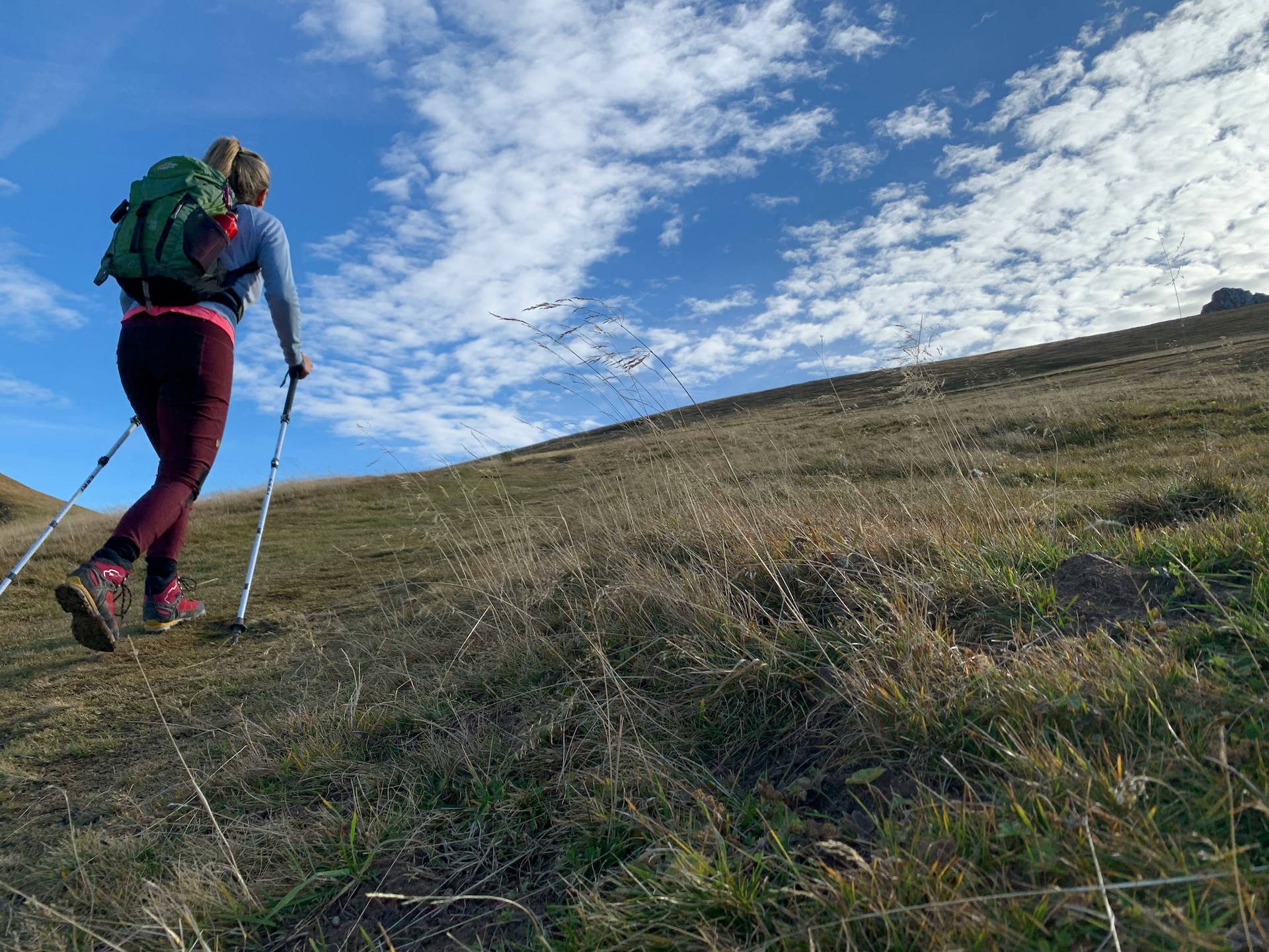 Why Fit Matters in Women’s Hiking Trousers Woman hiking showing why fit matters in women's hiking trousers