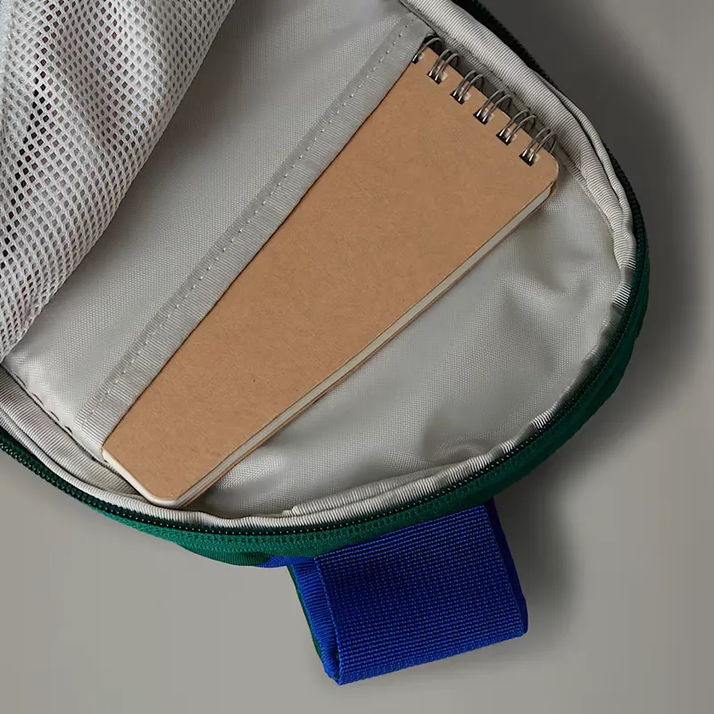 The North Face Borealis Sling in Blue/Evergreen-2